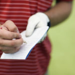 golfer-holding-scorecard